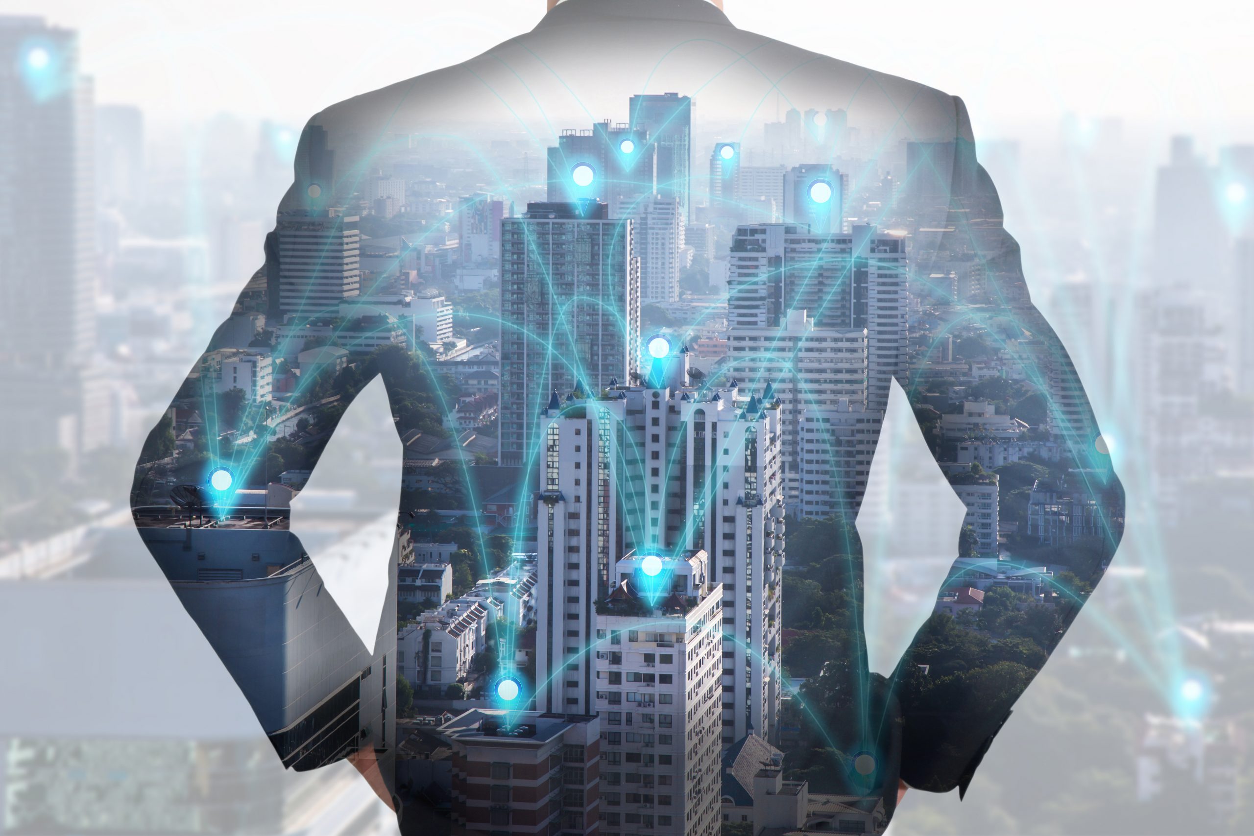 Double,Exposure,Of,A,Back,Turned,Businessman,,City,And,Urban